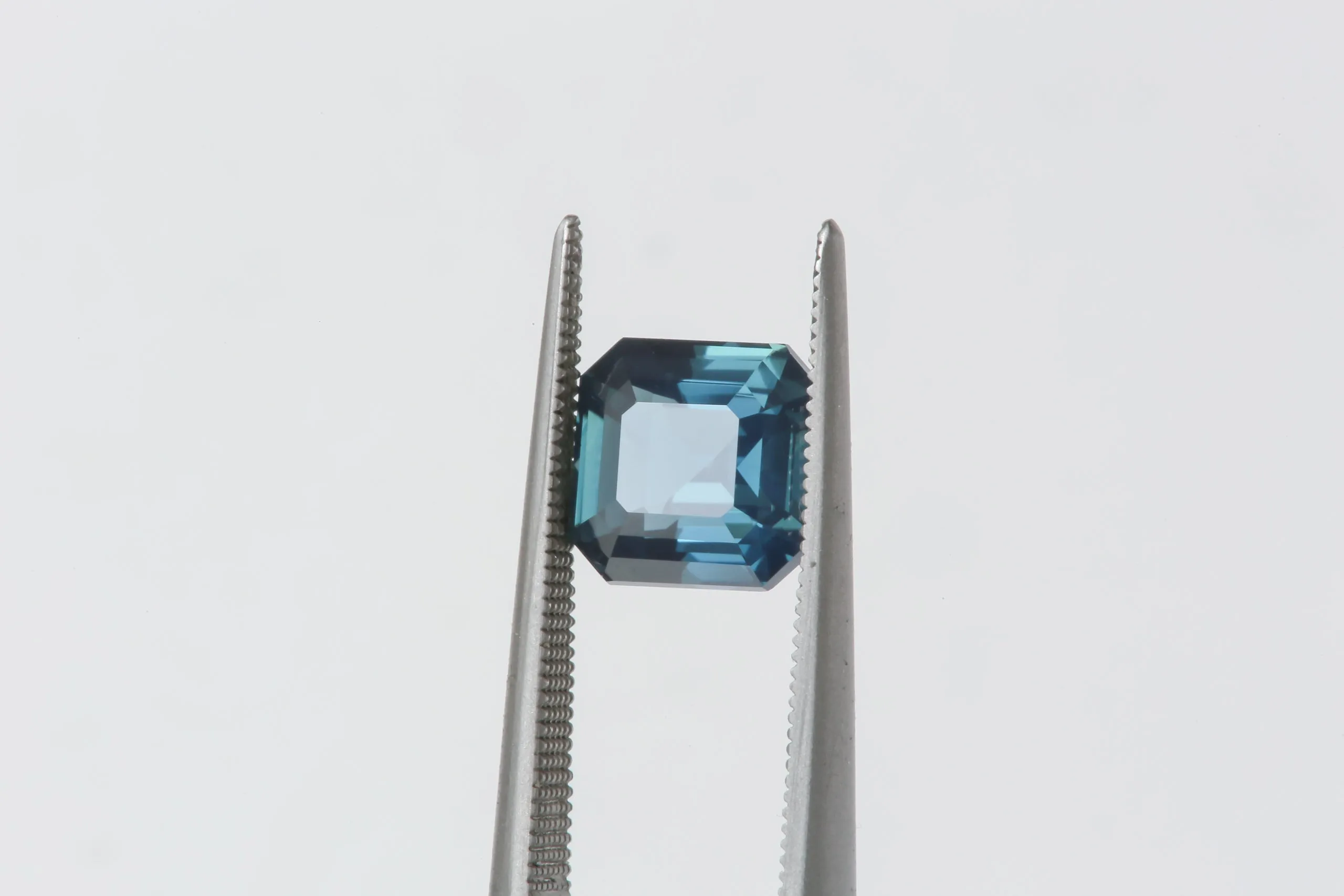 2.01 Carat Natural Teal Blue Opalescent Emerald Cut Sapphire