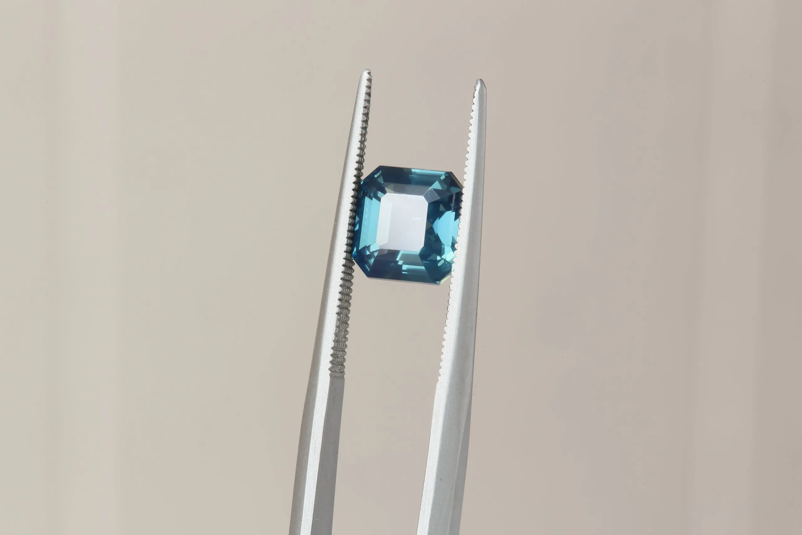 2.01 Carat Natural Teal Blue Opalescent Emerald Cut Sapphire