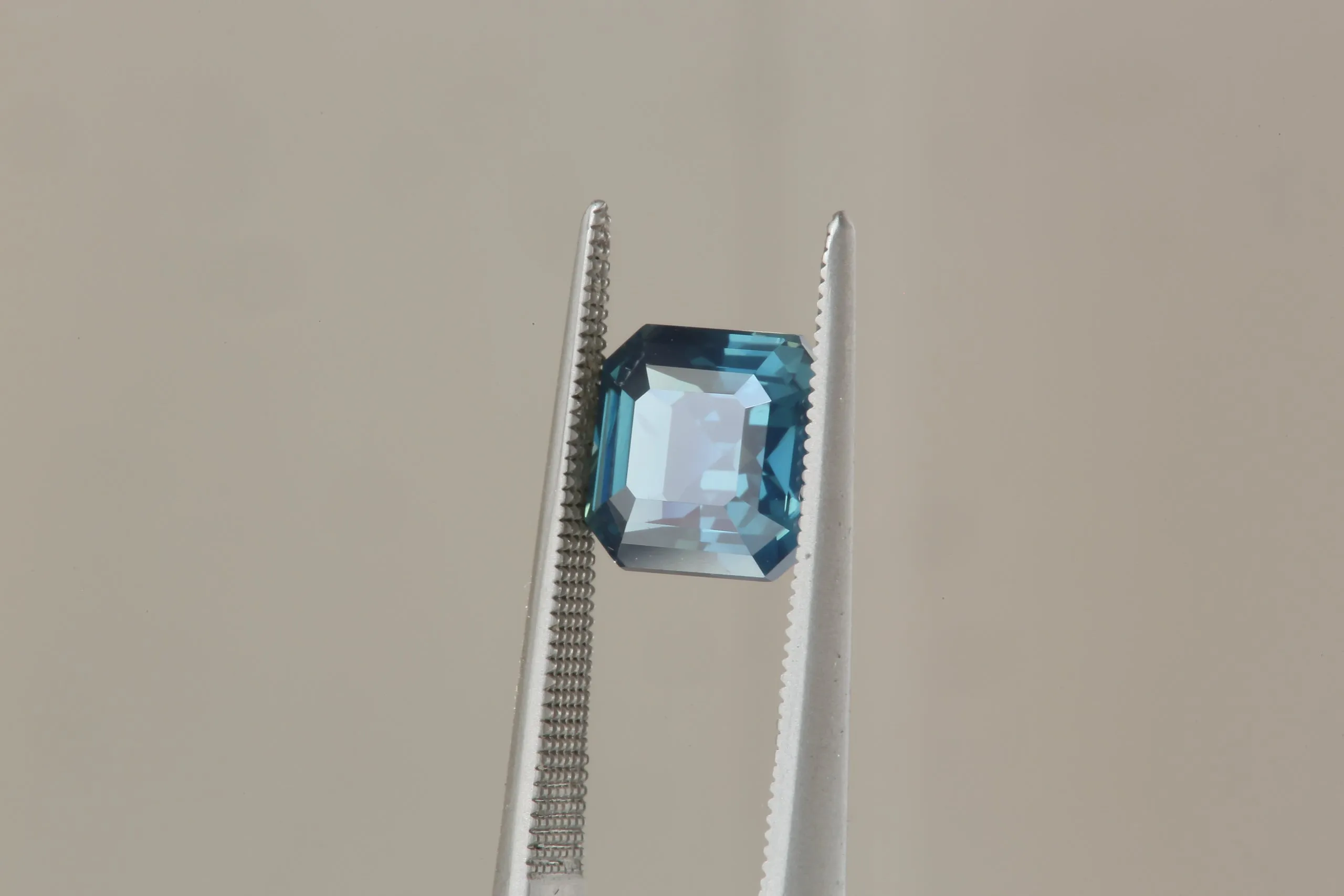 2.01 Carat Natural Teal Blue Opalescent Emerald Cut Sapphire