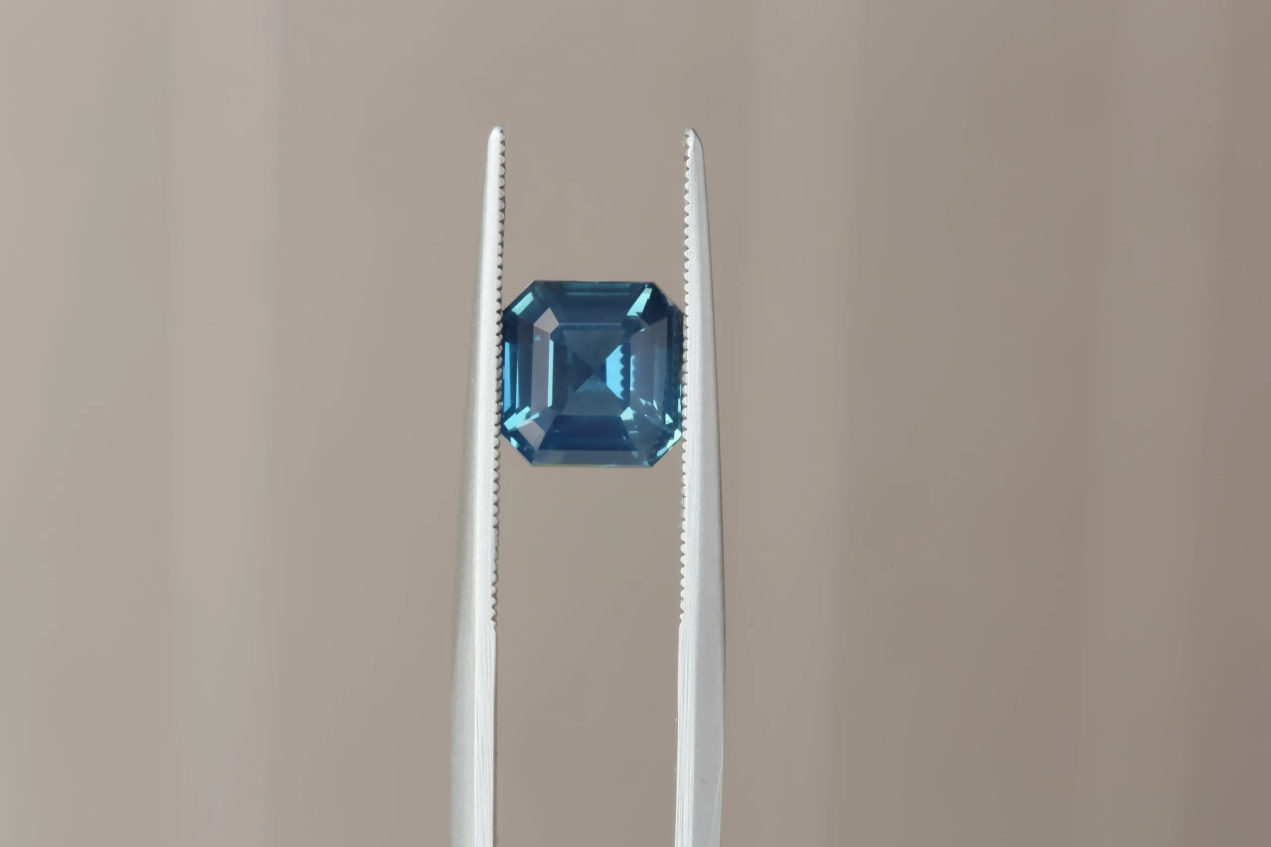 2.01 Carat Natural Teal Blue Opalescent Emerald Cut Sapphire