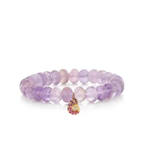 Gold & Sapphire Nautilus Shell on Amethyst